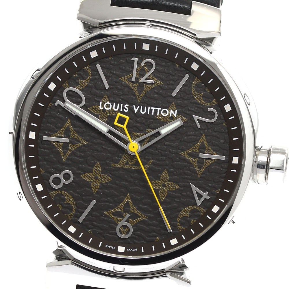 Louis Vuitton Tambour QA072Z mens quartz wristwatch brown dial: Louis Vuitton Tambour QA072Z mens quartz wristwatch brown dial Louis Vuitton Tambour men's wristwatch with quartz movement and a brown dial. This Swiss-made watch features a stainless steel case with 