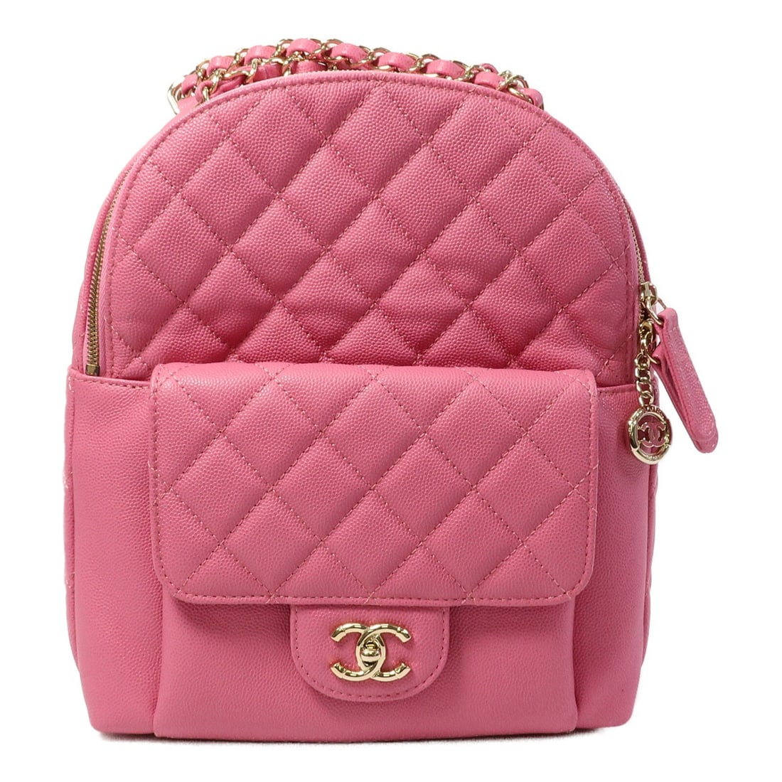 CHANEL CC Day Rucksack Backpack Pink Calfskin Leather GHW: CHANEL CC Day Rucksack Backpack Pink Calfskin Leather GHW A pink CHANEL rucksack backpack crafted from calfskin (cowhide). It features a flap-type exterior pocket and an open interior pocket, with a v