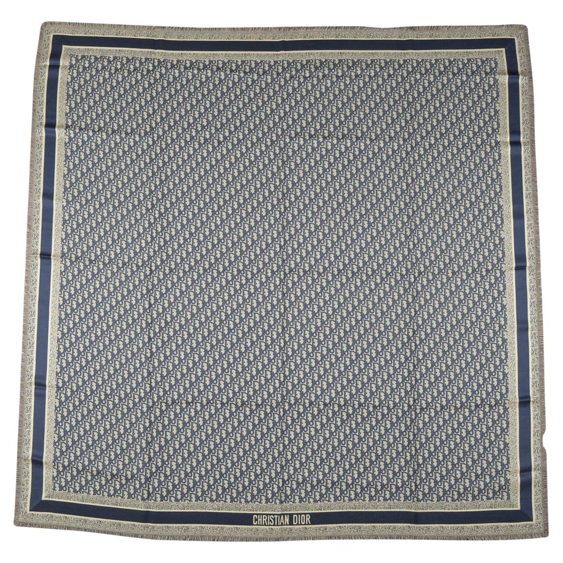 Christian Dior Diortwin Oblique Silk Shawl Gray and Navy Blue 51 x 54 in: Christian Dior Diortwin Oblique Silk Shawl Gray and Navy Blue 51 x 54 in This Dior "Diortwin" shawl is crafted from 100% silk and features the signature gray and navy blue Dior Oblique motif. The shaw