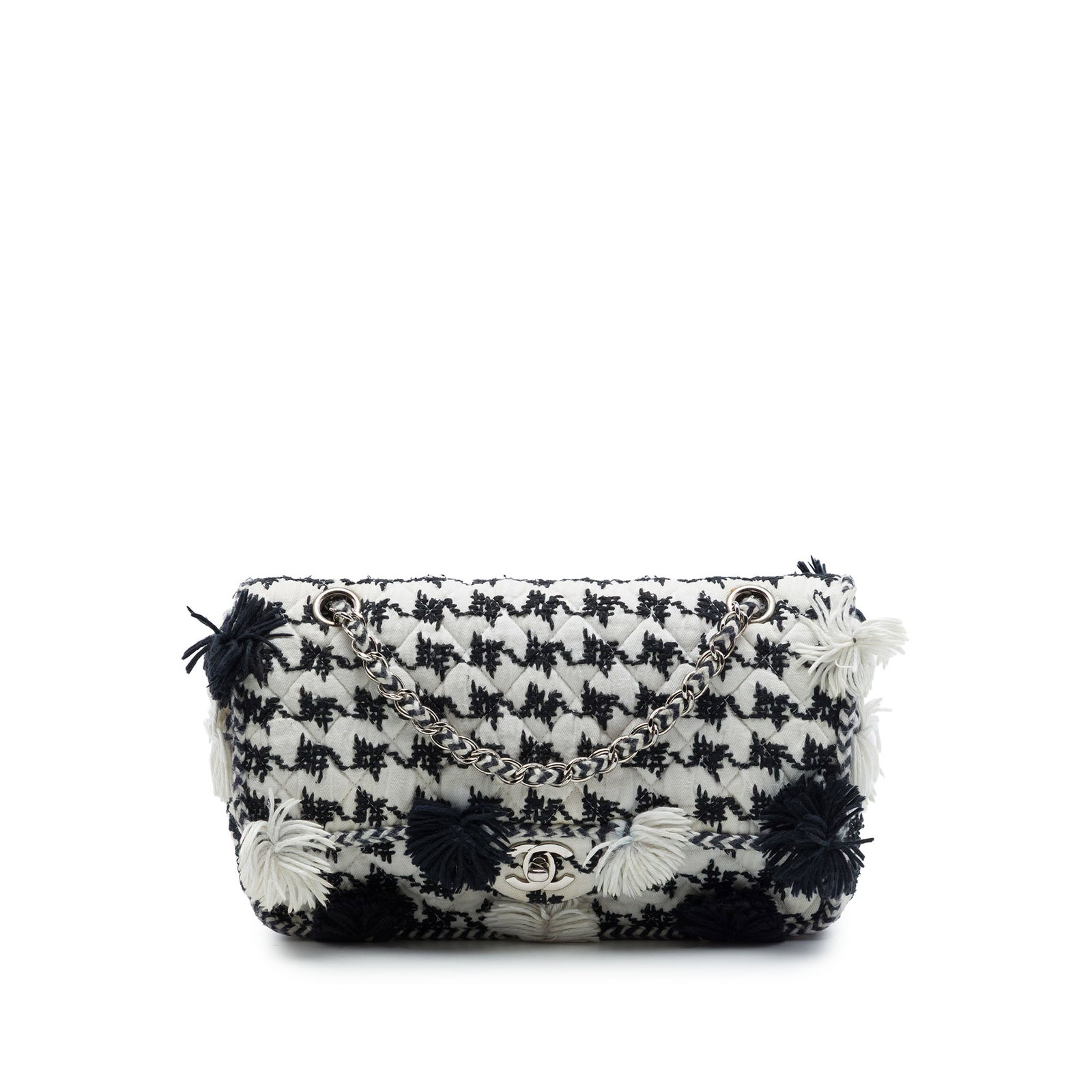 Chanel Medium Classic Flap Shoulder Bag Embroidered Houndstooth Canvas: Chanel Medium Classic Flap Shoulder Bag Embroidered Houndstooth Canvas Chanel Medium Classic Embroidered Canvas Houndstooth Pom Pom Flap shoulder bag with a quilted fabric body and pom pom detailing. 