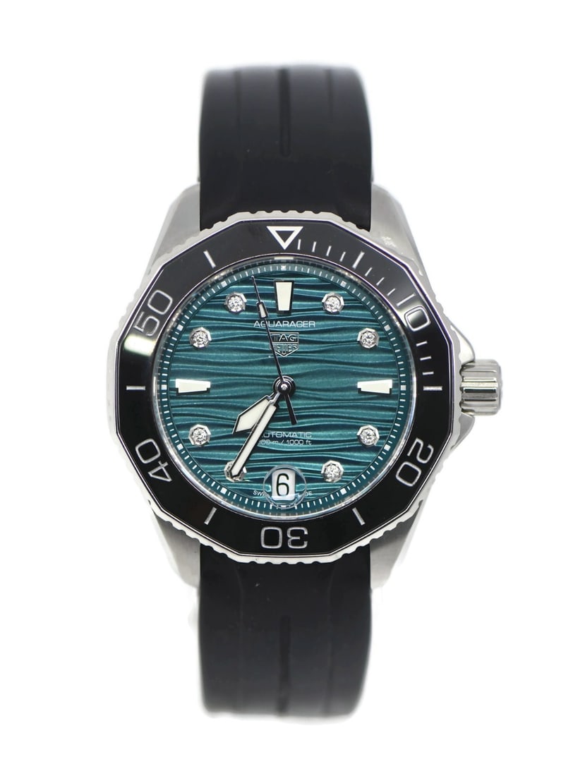 TAG Heuer Aquaracer 36mm wristwatch aftermarket strap ref WBP231G: TAG Heuer Aquaracer 36mm wristwatch aftermarket strap ref WBP231G TAG Heuer Aquaracer women's wristwatch with a green ocean wave dial and black unidirectional rotating bezel. This pre-owned automatic 