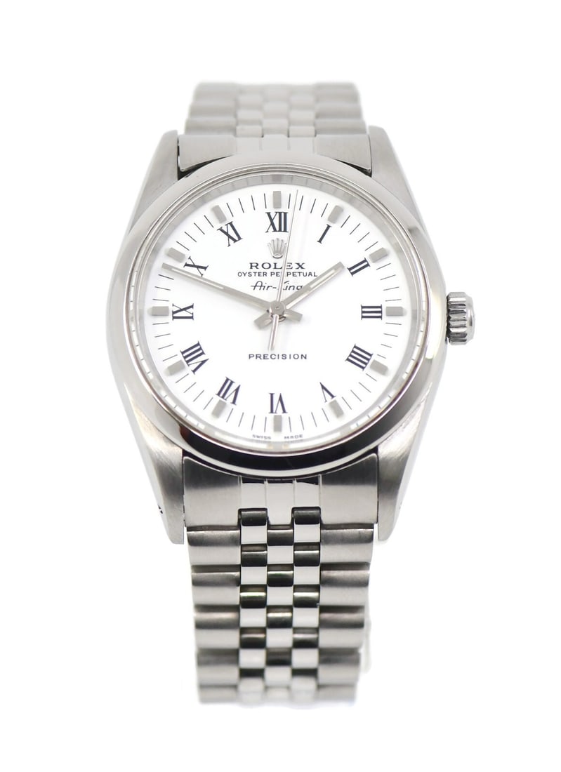 Rolex Air-King Stainless Steel Automatic Watch Ref 14000 with Box: Rolex Air-King Stainless Steel Automatic Watch Ref 14000 with Box Introducing the Rolex Air-King 14000, a classic wristwatch that embodies the elegance and precision synonymous with the Rolex brand. T