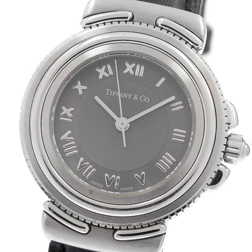 Tiffany Co Intaglio L0810 Womens Quartz Wristwatch Stainless Steel: Tiffany Co Intaglio L0810 Womens Quartz Wristwatch Stainless Steel TIFFANY&Co. Intaglio women's wristwatch with a quartz movement and a gray dial. The stainless steel case is paired with an un-used af