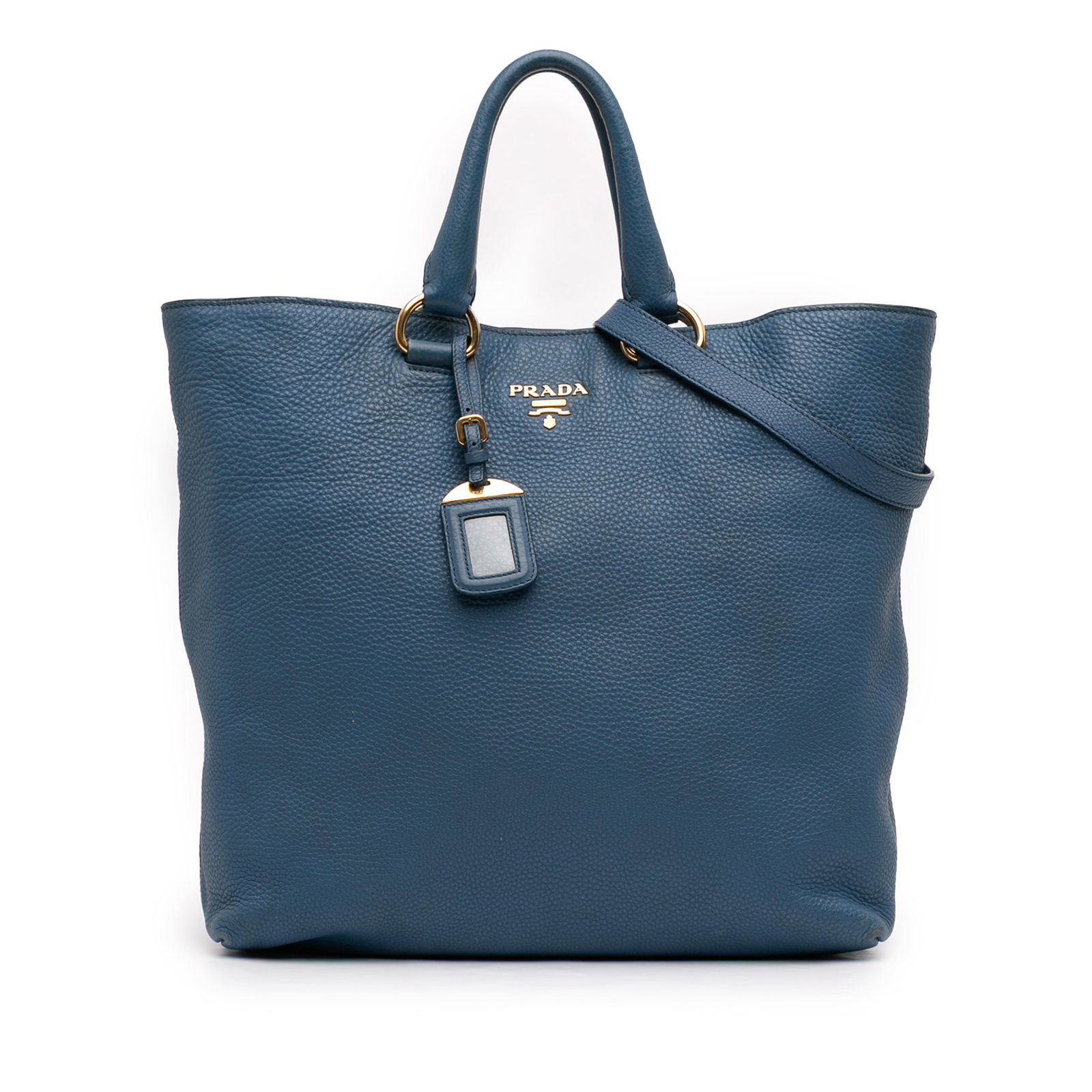 Prada Blue Leather Vitello Daino Convertible Tote: Prada Blue Leather Vitello Daino Convertible Tote This Prada Vitello Daino Open Convertible Tote is crafted from blue leather and features rolled leather handles and a detachable flat leather strap fo