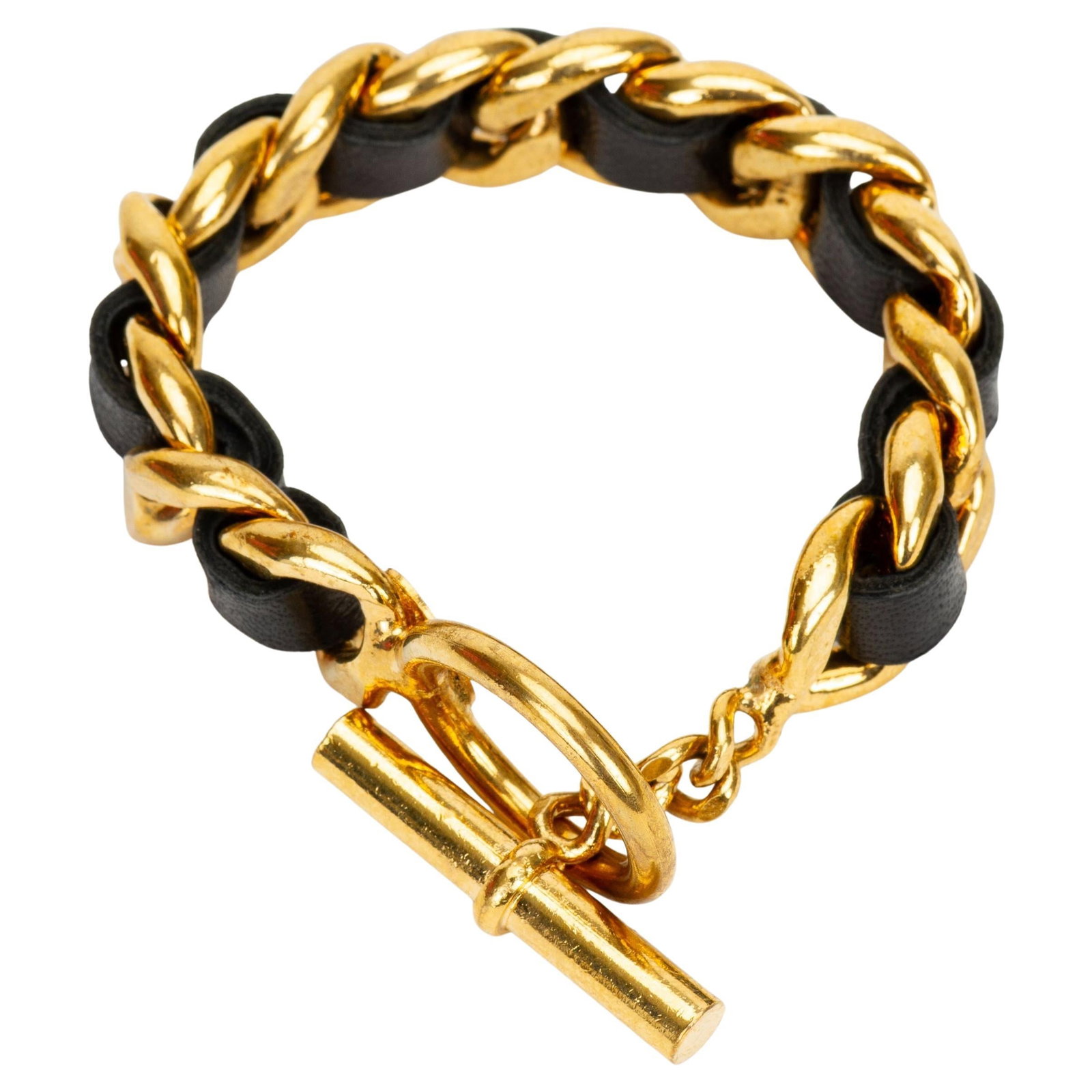 Chanel Black Leather Woven Gold Tone Chain Bracelet 1980 France: Chanel Black Leather Woven Gold Tone Chain Bracelet 1980 France This Chanel 80 black leather chain bracelet features a distinctive leather-woven gold-tone metal design and is secured with a toggle cla