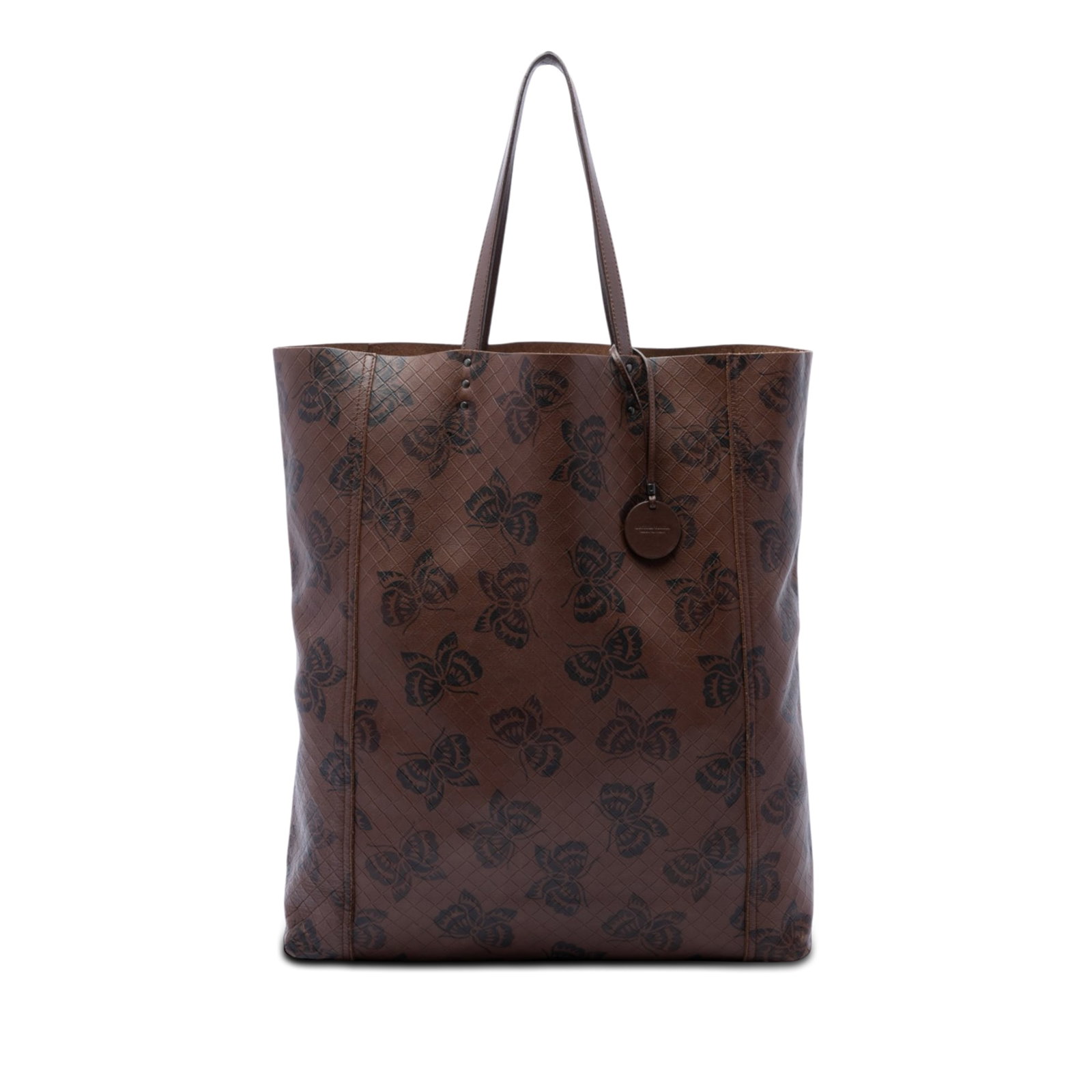 Brown Leather Tote Bottega Veneta Intrecciomirage Butterfly: Brown Leather Tote Bottega Veneta Intrecciomirage Butterfly A Bottega Veneta Leather Intrecciomirage Butterfly Tote crafted in brown embossed leather with flat leather handles and an open top. Made in