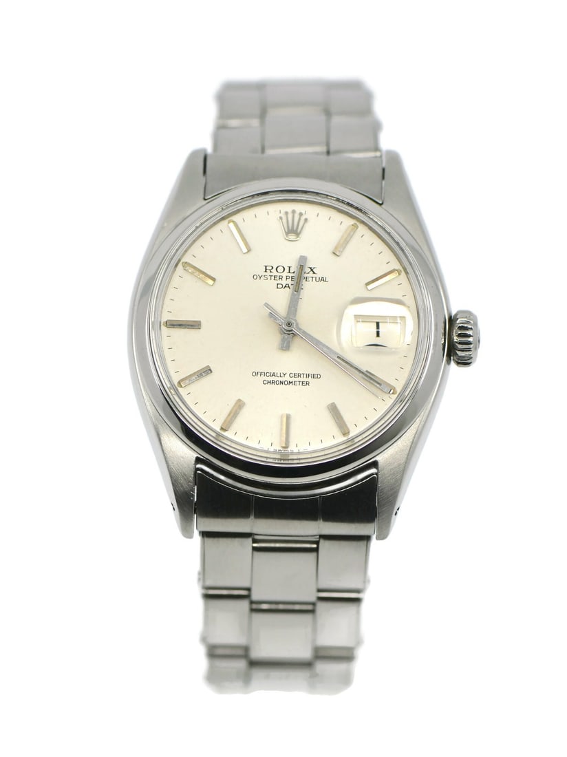 Rolex 6534 Oyster Perpetual men's stainless steel wristwatch: Rolex 6534 Oyster Perpetual men's stainless steel wristwatch Rolex Oyster Perpetual reference 6534 wristwatch with an automatic mechanical movement and classic analog display. This men's pre-owned wat