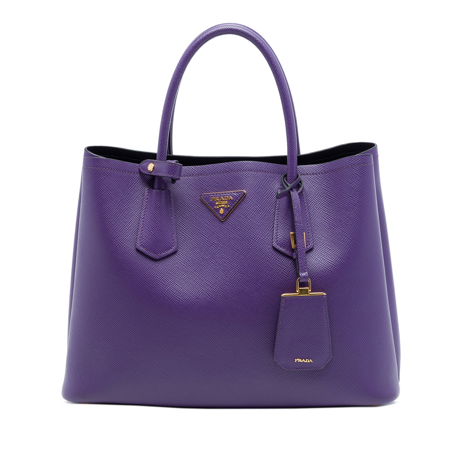 Prada Medium Double Satchel in Purple Saffiano Leather: Prada Medium Double Satchel in Purple Saffiano Leather A Prada Medium Saffiano Cuir Double Satchel in purple leather with rolled leather handles, an open top with magnetic closure, and an interior fla