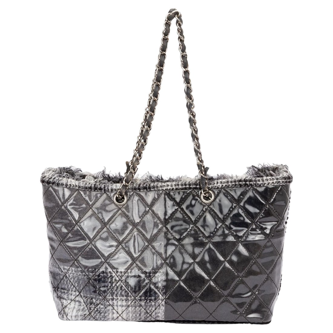 Chanel Large Fantasy Tweed Tote 2009 Karl Lagerfeld Authenticity Card: Chanel Large Fantasy Tweed Tote 2009 Karl Lagerfeld Authenticity Card Introducing the Chanel Large Fantasy Tweed Quilted Tote, a stunning piece from the 2009 Karl Lagerfeld Collection. This tote is ex