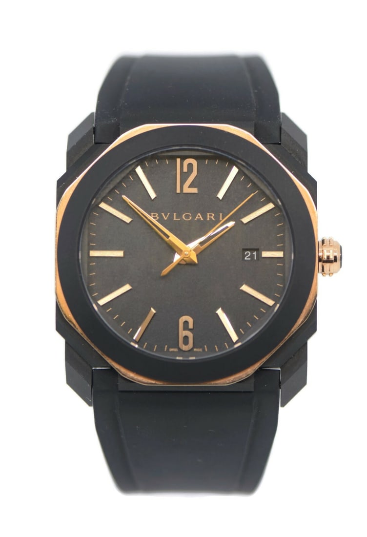 Bulgari Octo 18K Rose Gold Black Stainless Steel Watch 41mm Ref 103085: Bulgari Octo 18K Rose Gold Black Stainless Steel Watch 41mm Ref 103085 Introducing the Bulgari Octo wristwatch, a stunning blend of luxury and modern design. This timepiece features an exquisite 18K r