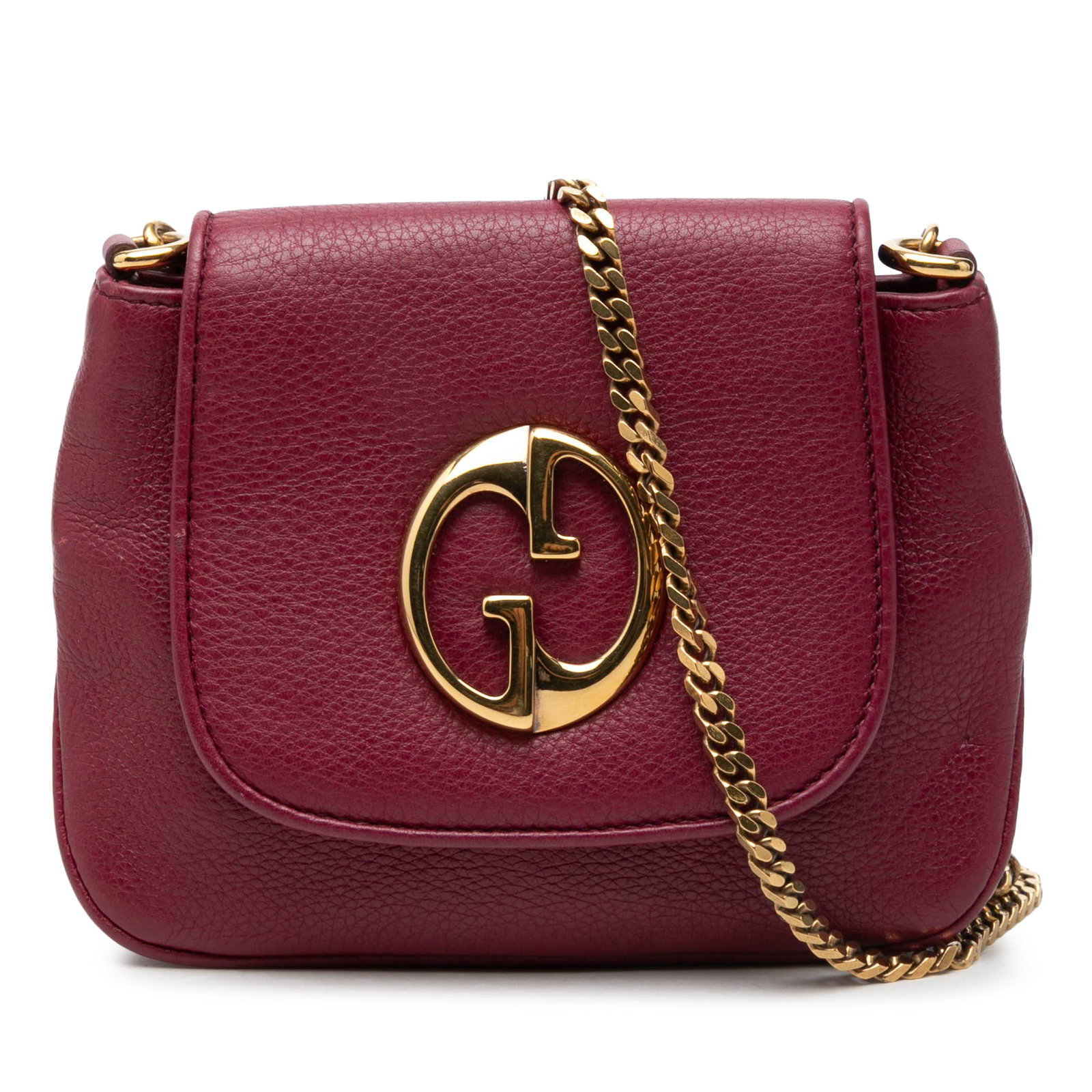 Gucci 1973 Small Calfskin Chain Crossbody Bag Red: Gucci 1973 Small Calfskin Chain Crossbody Bag Red A Gucci Small Calfskin 1973 Chain Crossbody in red leather with a chain link shoulder strap and a top flap with magnetic snap closure. The interior in