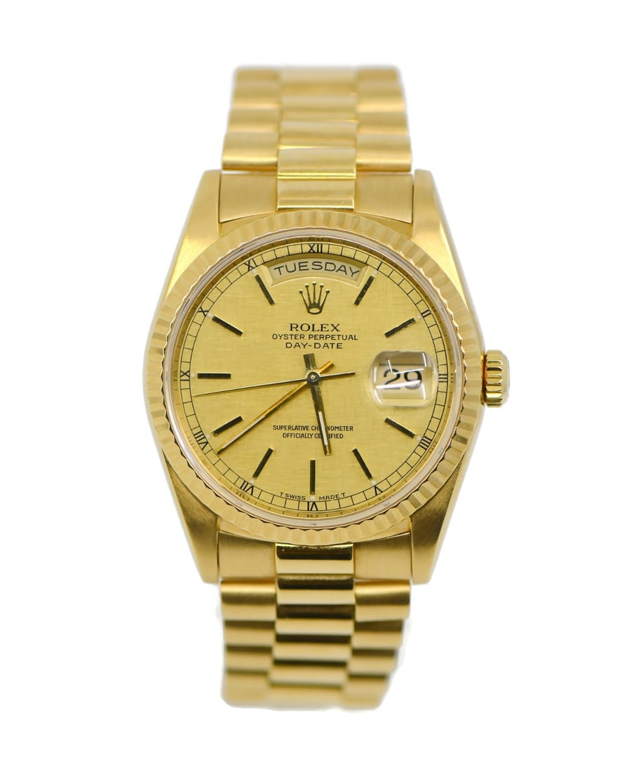 Rolex 18238 Day-Date 18K Yellow Gold Wristwatch 36 mm: Rolex 18238 Day-Date 18K Yellow Gold Wristwatch 36 mm Rolex Day-Date reference 18238 in 18K yellow gold with the classic President bracelet and a fluted bezel. This pre-owned men's wristwatch features