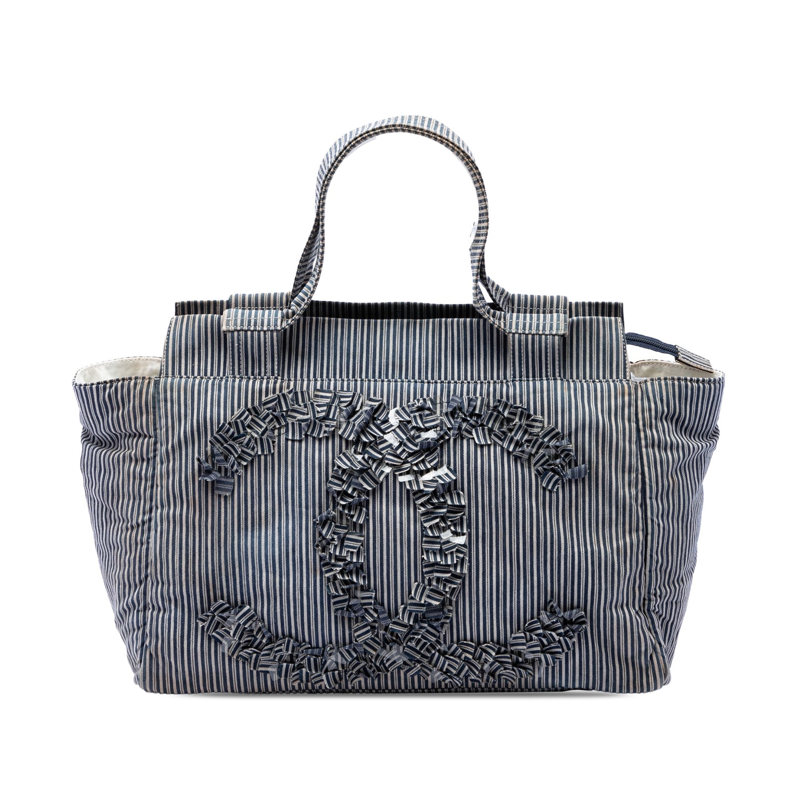 Chanel CC Striped Shopper Tote Blue Canvas Bag: Chanel CC Striped Shopper Tote Blue Canvas Bag Chanel CC Striped Canvas Shopper Tote in blue striped fabric with flat handles, a top zip closure, and interior zip and slip pockets. Made in Italy. Cond