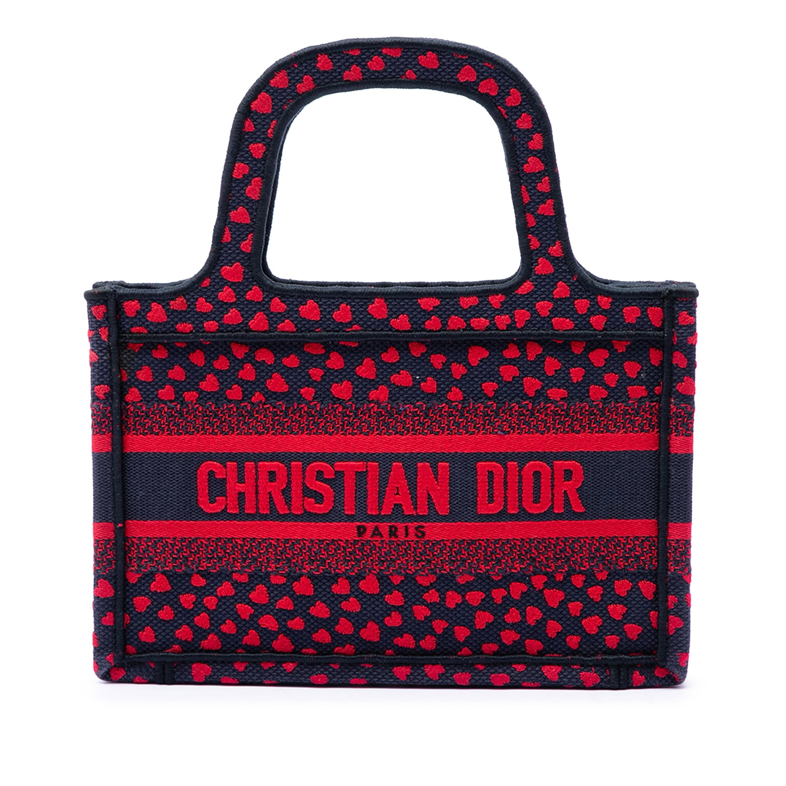 Dior Pop Heart I Love Paris Mini Book Tote in Embroidered Canvas: Dior Pop Heart I Love Paris Mini Book Tote in Embroidered Canvas A Dior Mini Book Tote in embroidered canvas featuring the Pop Heart I Love Paris design. This open-top bag has flat handles and a compa