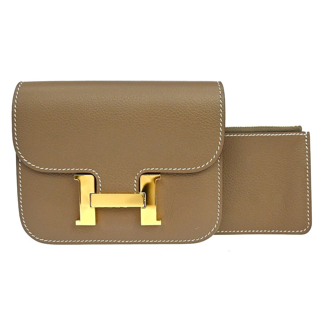 Hermes Constance Slim Wallet in Etoupe Evercolor Leather: Hermes Constance Slim Wallet in Etoupe Evercolor Leather Hermes Constance Slim Wallet in Etoupe Evercolor leather with logo accent. This women's wallet is made in France and includes two interior pock