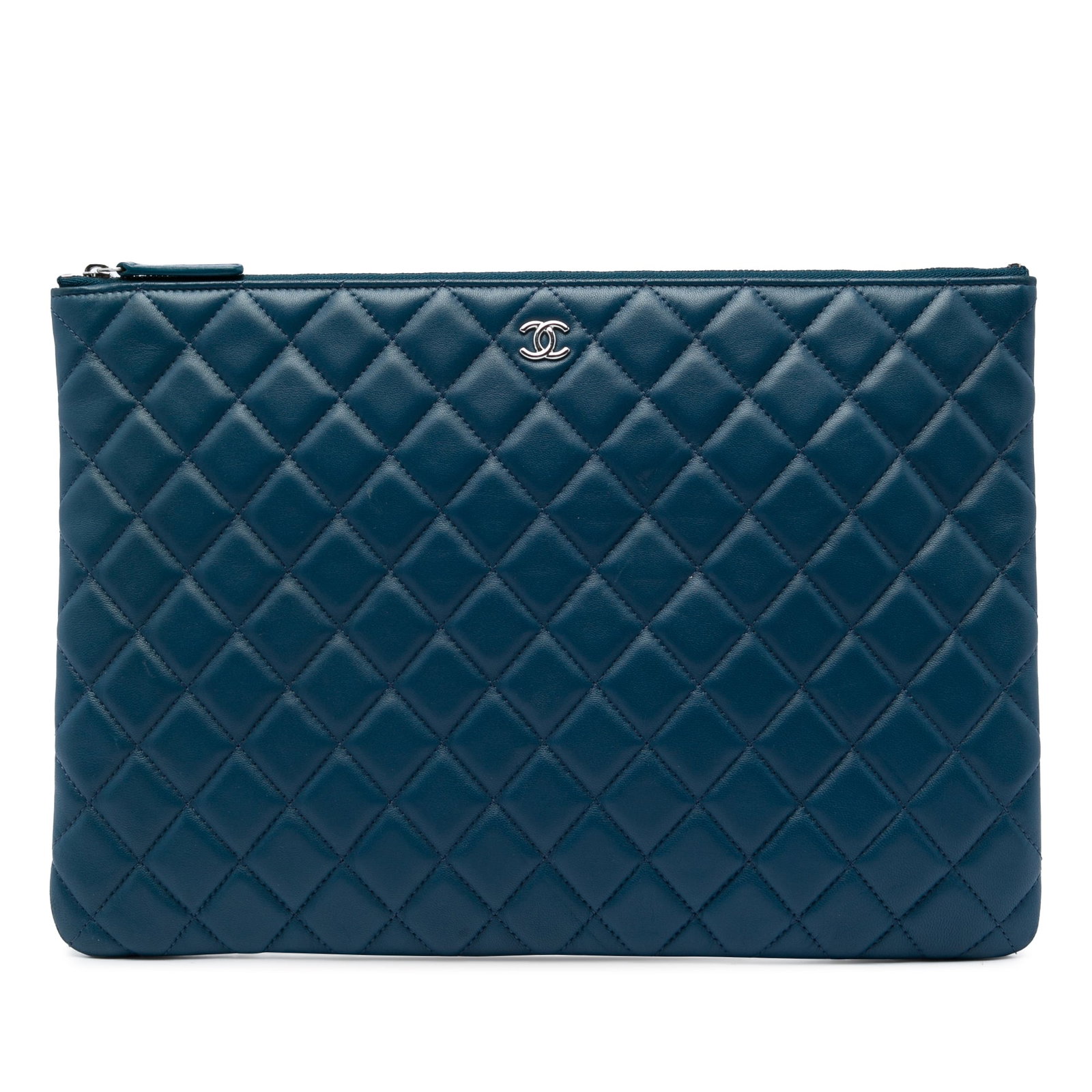 Chanel O Case Large Blue Quilted Lambskin Clutch: Chanel O Case Large Blue Quilted Lambskin Clutch Large Chanel O Case clutch in blue quilted lambskin leather with a top zip closure, an exterior back slip pocket, and an interior zip pocket. Made in I