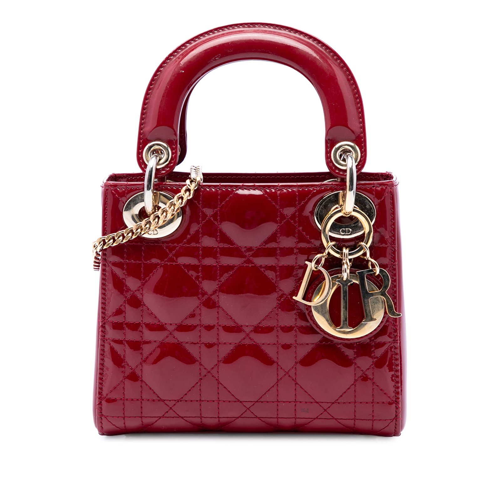 Dior Lady Dior Mini Cannage Patent Leather Bag Red: Dior Lady Dior Mini Cannage Patent Leather Bag Red A compact Lady Dior handbag crafted in red patent leather with the signature Cannage quilted design. This mini bag features flat top handles, a detac