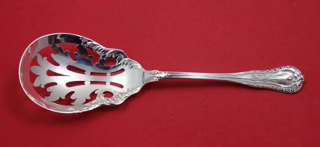 Dominick and Haff Acanthus sterling ice spoon 9 in: Dominick and Haff Acanthus sterling ice spoon 9 in Sterling silver ice spoon in the Acanthus pattern by Dominick & Haff, made in the United States and measuring 9 inches long. It is monogrammed, with 