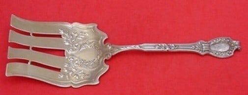 Durgin Du Barry Sterling Silver Serving Fork Gold Washed 9 7/8": Durgin Du Barry Sterling Silver Serving Fork Gold Washed 9 7/8" Sterling silver asparagus serving fork in the Du Barry pattern by Durgin, featuring a gold-washed finish. It is monogrammed, with monos 