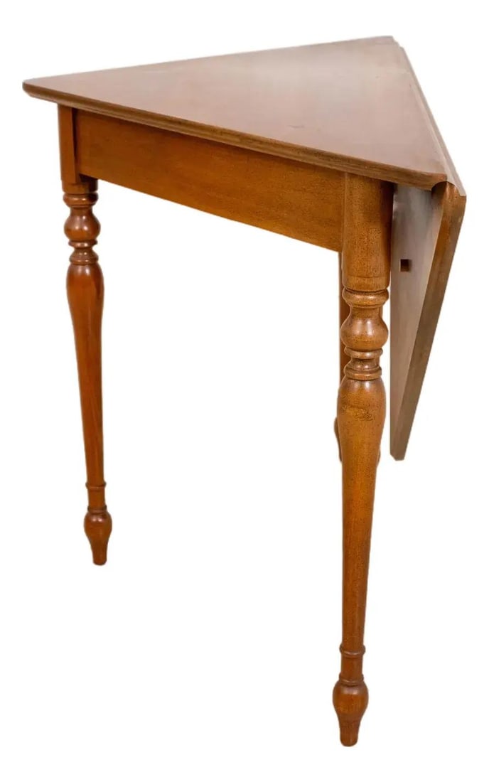 Harden Cherry Wood Triangular Dropleaf Table with Turned Legs: Harden Cherry Wood Triangular Dropleaf Table with Turned Legs This Harden Cherry Triangular Napkin Dropleaf Table showcases exquisite craftsmanship with its quality construction and elegant design. Ma
