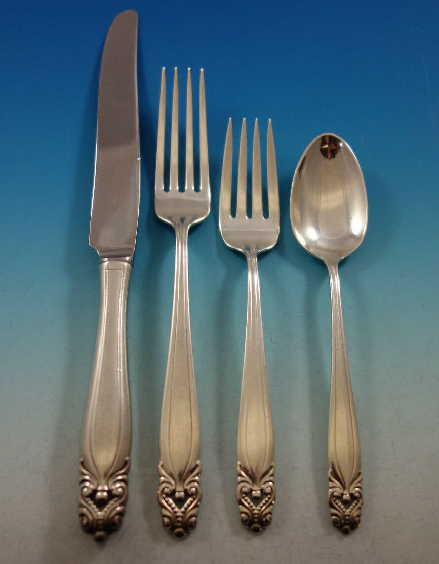 Wallace King Christian Sterling Silver 4-Piece Place Setting: Wallace King Christian Sterling Silver 4-Piece Place Setting This exquisite 4-piece place setting in the King Christian pattern by Wallace is crafted from high-quality sterling silver, dating from 190