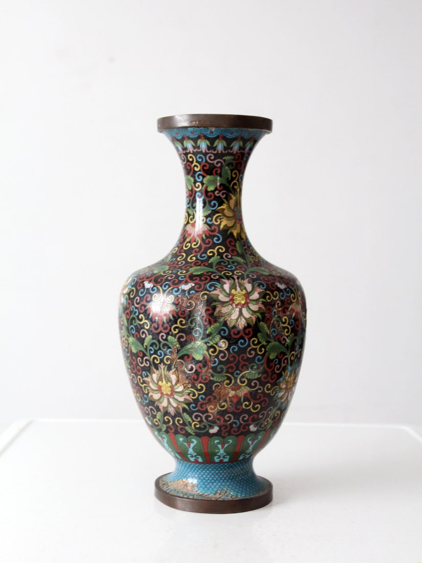 Chinese Cloisonne Enamel Vessel with Lotus Motif 16 inch: Chinese Cloisonne Enamel Vessel with Lotus Motif 16 inch An antique Chinese cloisonne decorative vessel featuring colorful lotus blossoms and scrolling vines on a black ground. Turquoise enamel border