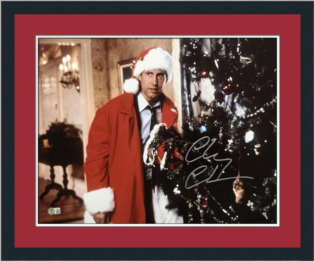 Beckett Authenticated Chevy Chase Christmas Vacation Framed Photo 22 x 26: Beckett Authenticated Chevy Chase Christmas Vacation Framed Photo 22 x 26 This is a custom framed photograph signed by Chevy Chase from the movie "Christmas Vacation." The photograph measures 16" x 20