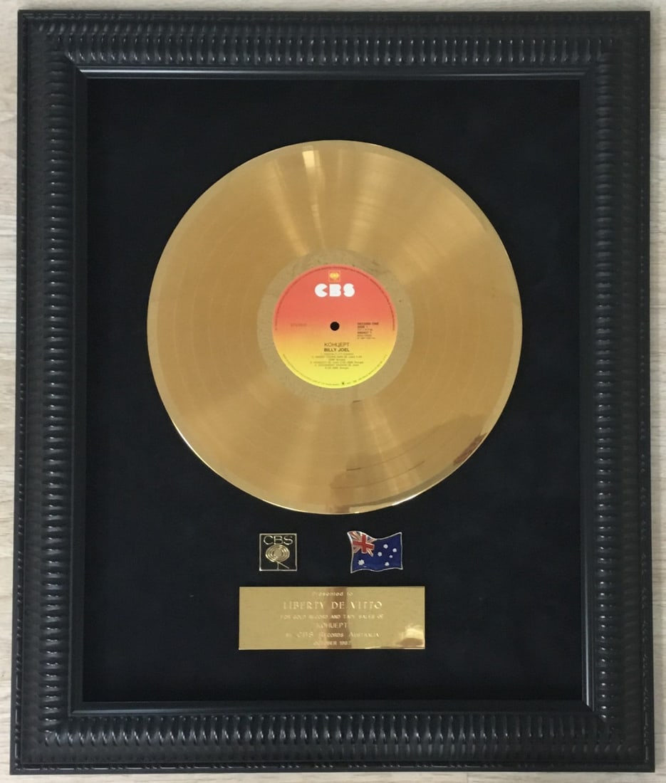 Billy Joel Gold Record Award Liberty Devitto Custom Framed 24 x 20: Billy Joel Gold Record Award Liberty Devitto Custom Framed 24 x 20 Celebrate the music of Billy Joel with this stunning gold record award, custom framed to perfection. This original piece is an exquis