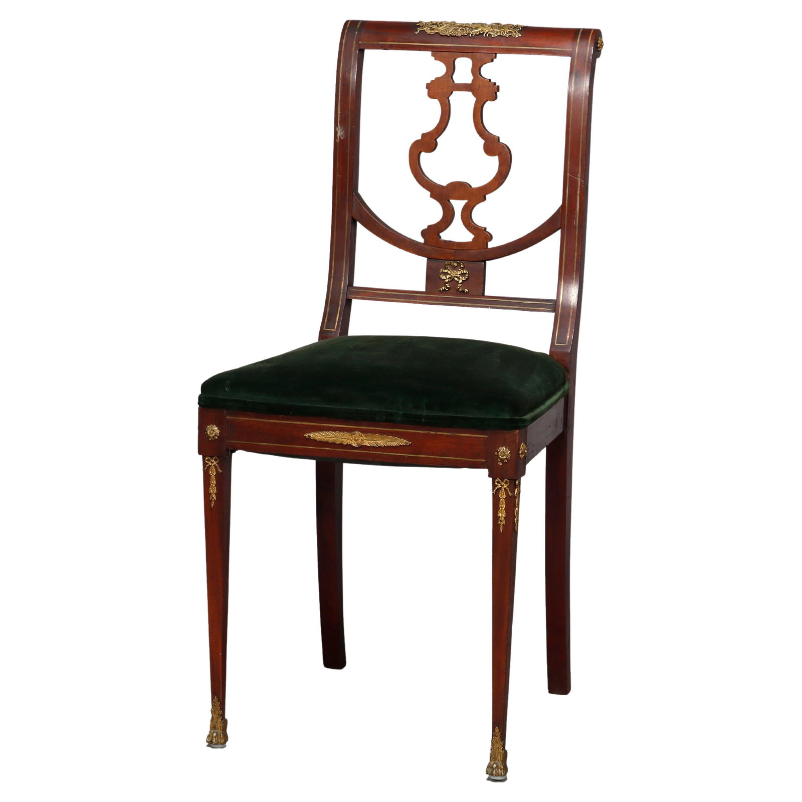 19th Century French Empire Mahogany Side Chair with Ormolu Mounts: 19th Century French Empire Mahogany Side Chair with Ormolu Mounts This exquisite antique French Empire side chair, dating back to the 19th century, features a stunning mahogany construction characteri