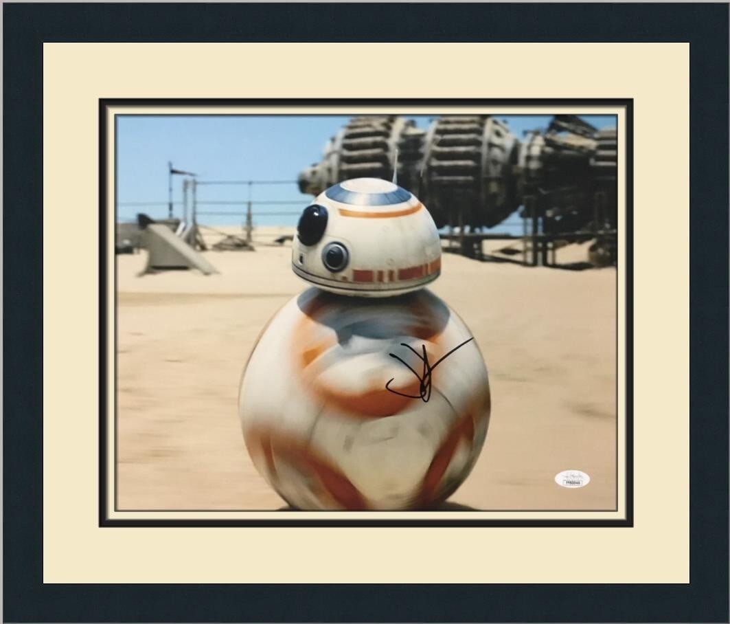 JJ Abrams Signed Star Wars The Force Awakens Photo Custom Framed JSA Authenticated: JJ Abrams Signed Star Wars The Force Awakens Photo Custom Framed JSA Authenticated This stunning custom framed photograph features JJ Abrams, the acclaimed director of Star Wars: The Force Awakens. Th