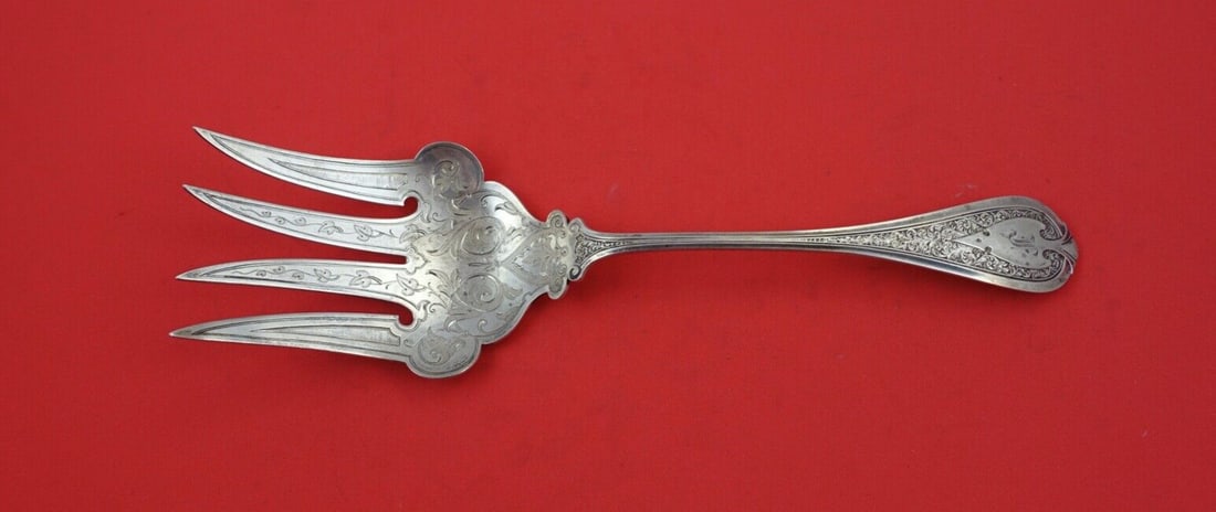 Sterling Silver Fish Serving Fork Florentine by Wendt 9 1/4 brite-cut: Sterling Silver Fish Serving Fork Florentine by Wendt 9 1/4 brite-cut Sterling silver fish serving fork in the Florentine pattern by Wendt, featuring brite-cut decoration and an ornate handle design. 