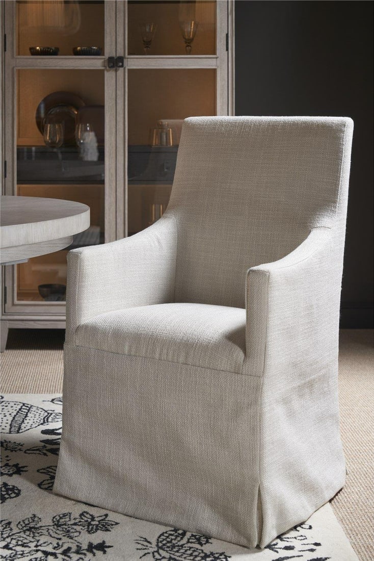 Universal Manning Chair in Asbury Oyster Rolling Fog: Universal Manning Chair in Asbury Oyster Rolling Fog Introducing the sophisticated Manning Chair, a perfect blend of style and comfort. This chair features a contemporary design with a finish in Asbur