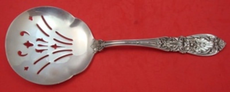 International Richelieu Sterling Silver Pierced Tomato Server 8": International Richelieu Sterling Silver Pierced Tomato Server 8" Sterling silver tomato server in the Richelieu pattern by International. This pierced serving piece measures 8 inches and is not monogr