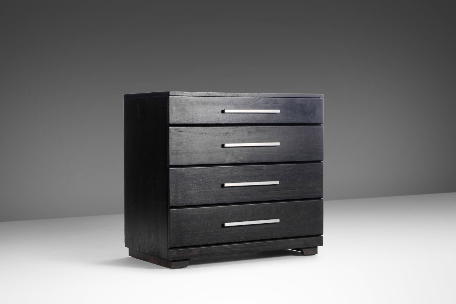 Raymond Loewy Mengel Ebonized Four Drawer Dresser Mid-Century Modern USA 1950s: Raymond Loewy Mengel Ebonized Four Drawer Dresser Mid-Century Modern USA 1950s This stunning ebonized four-drawer dresser, designed by renowned industrial designer Raymond Loewy for Mengel, showcases 