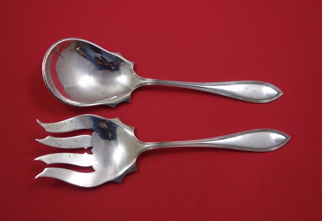 Puritan International Sterling Silver Salad Serving Set 2pc 8 3/4 inches: Puritan International Sterling Silver Salad Serving Set 2pc 8 3/4 inches Elevate your dining experience with this exquisite Puritan by International Sterling Silver Salad Serving Set. This 2-piece set