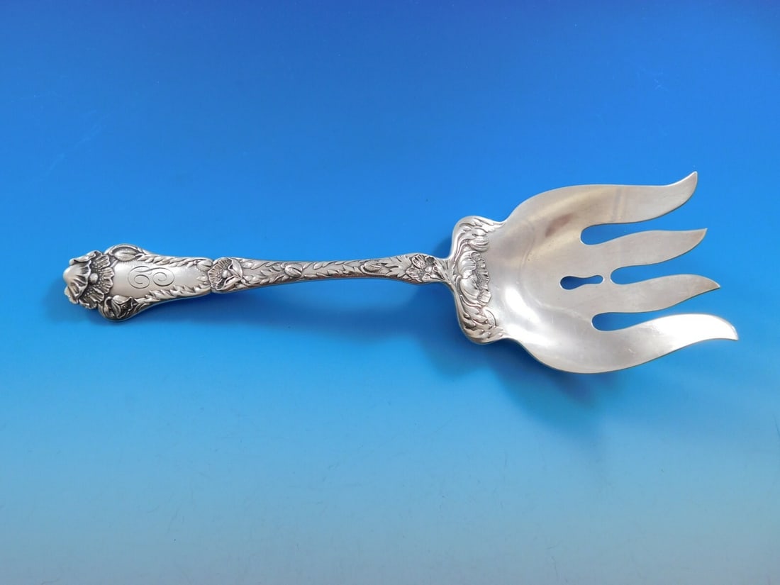 Gorham Poppy Sterling Silver Fish Serving Fork 8 3/4 inches: Gorham Poppy Sterling Silver Fish Serving Fork 8 3/4 inches This exquisite serving fork from the Poppy pattern by Gorham is crafted from high-quality sterling silver. Measuring 8 3/4 inches, this larg