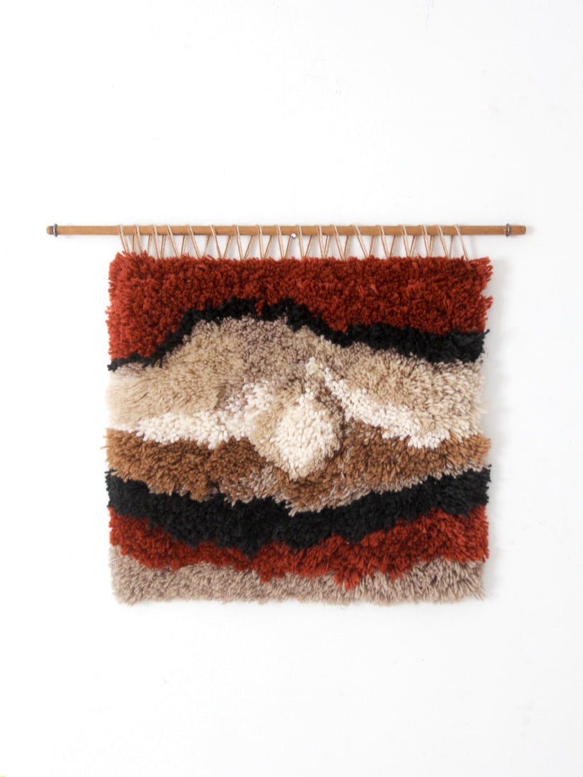 1970s Abstract Fiber Textile Wall Hanging 19 x 17: 1970s Abstract Fiber Textile Wall Hanging 19 x 17 Vintage 1970s latch hook fiber art wall hanging with a bold abstract design and deep textured yarn pile. The composition features sweeping bands of ru