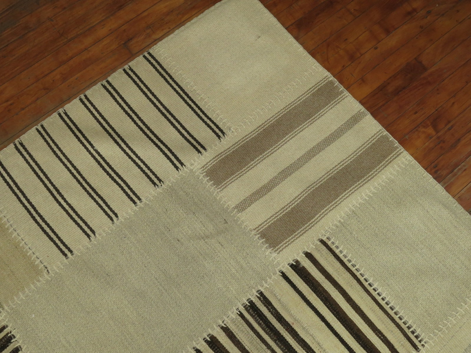 10' 7" x 14' 4" Turkish Patchwork Kilim Rug Cream Beige: 10' 7" x 14' 4" Turkish Patchwork Kilim Rug Cream Beige High quality Turkish patchwork kilim in cream and beige, designed for room-size use. This pre-owned rug features a neutral patchwork layout that