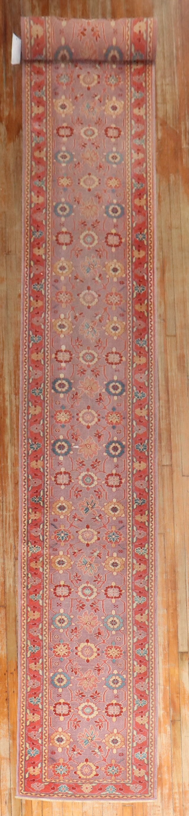 2' 8" x 22' 5" Turkish runner rug with purple field: 2' 8" x 22' 5" Turkish runner rug with purple field One-of-a-kind Turkish runner featuring a long, narrow profile and a rare purple field. This pre-owned rug offers an eye-catching decorative presence