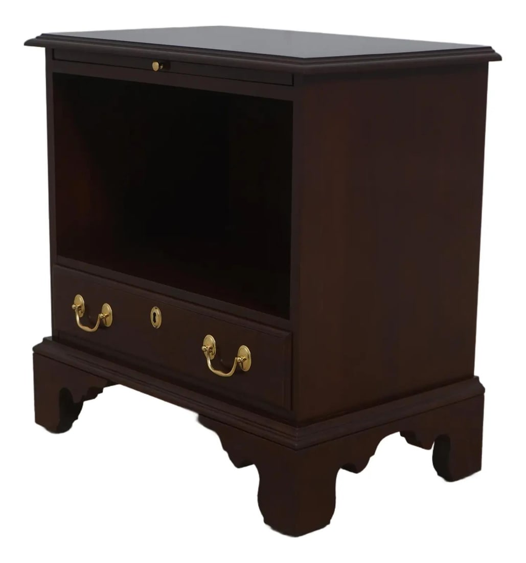 Cherry Wood Georgian Nightstand by Harden with Single Drawer and Brass Pulls: Cherry Wood Georgian Nightstand by Harden with Single Drawer and Brass Pulls This Georgian style nightstand from the 1980s features a single dovetailed drawer, solid brass hardware, and a pull-out wri