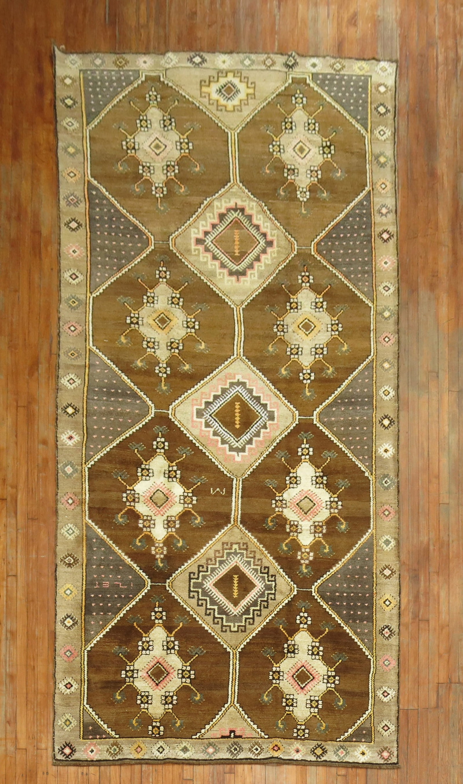 6' 4" x 13' 6" Brown Kars Gallery Rug Turkish Tribal: 6' 4" x 13' 6" Brown Kars Gallery Rug Turkish Tribal Vintage Turkish Kars tribal rug from the 20th century, featuring a brown field with geometric motifs and a central diamond design. This pre-owned g