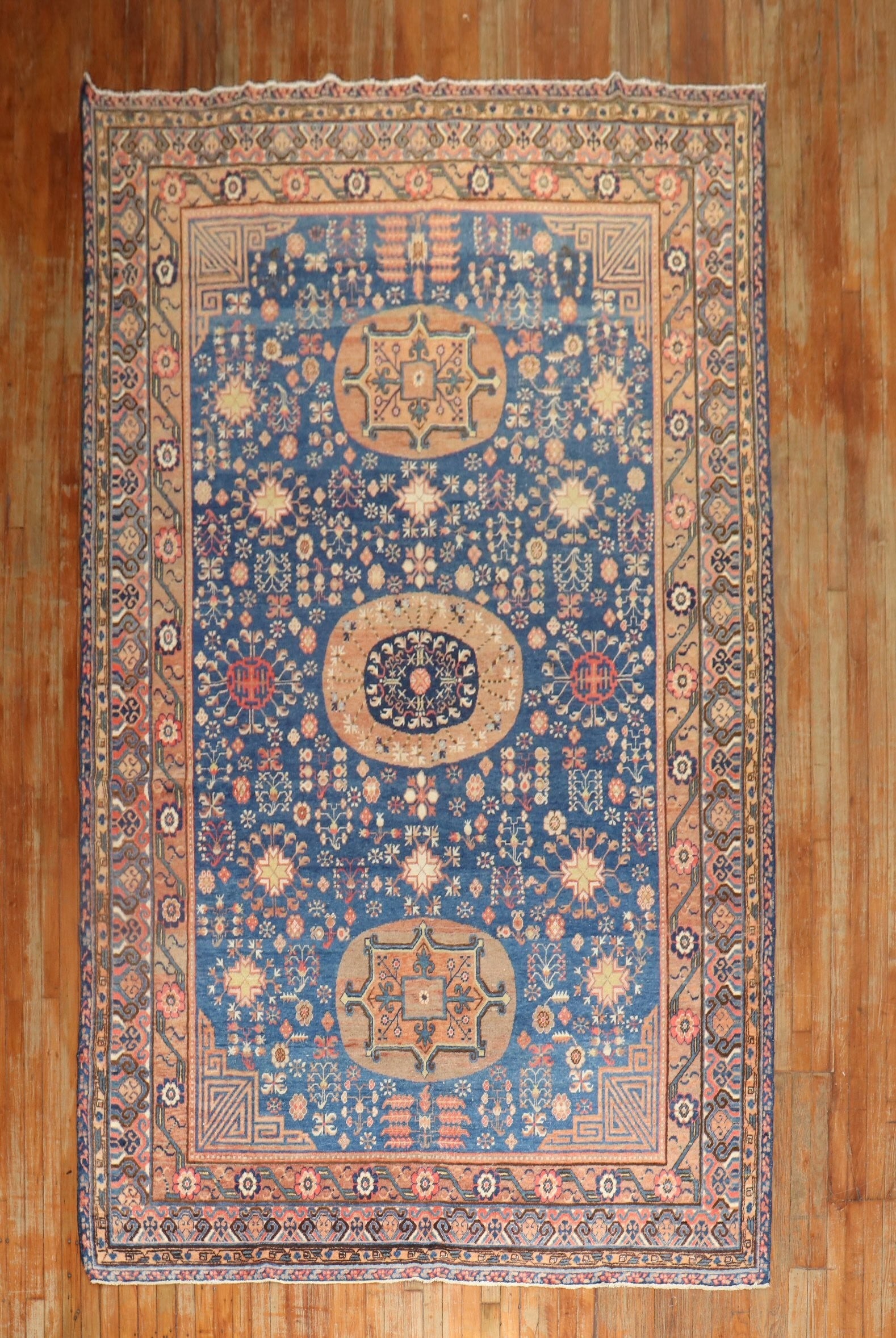 6' 10" x 13' 2" Late 19th Century Khotan Gallery Rug Blue: 6' 10" x 13' 2" Late 19th Century Khotan Gallery Rug Blue Late 19th century antique Khotan gallery rug in a blue colorway, featuring an intricate decorative pattern. Pre-owned. Specifications Type: Kh