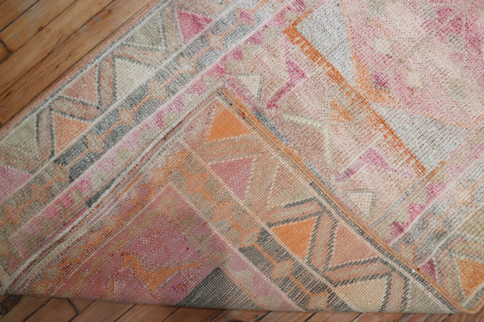 2' 10" x 21' 7" Anatolian Turkish Geometric Runner in Pastel Tones: 2' 10" x 21' 7" Anatolian Turkish Geometric Runner in Pastel Tones Mid 20th-century Turkish geometric runner in pastel tones with pink, orange, and cream accents. This Anatolian runner features a long