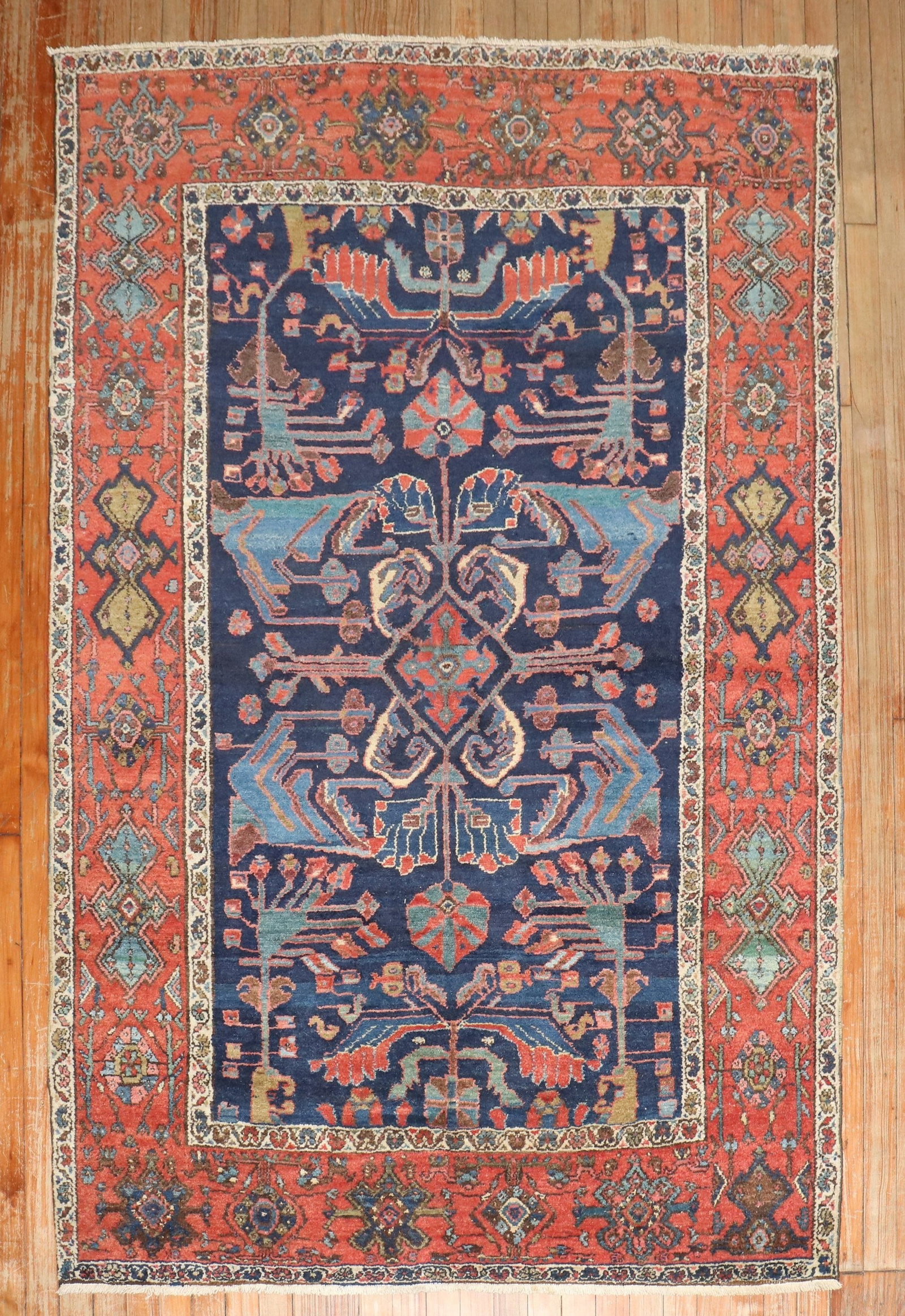 4' 6" x 6' 9" Early 20th Century N.W. Persian Rug: 4' 6" x 6' 9" Early 20th Century N.W. Persian Rug Early 20th century Northwest Persian accent rug with an intricate floral and geometric pattern. This pre-owned rug offers a classic decorative look su