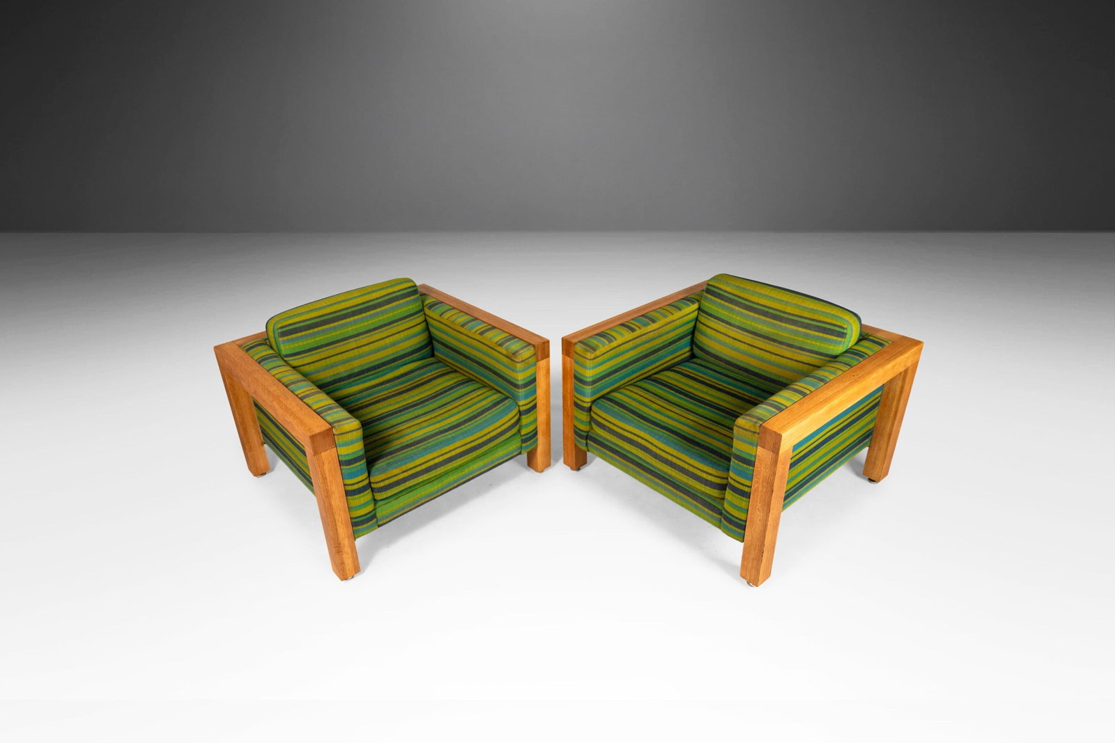 Pair of 1970s Modernist Cube Chairs After George Nelson for Herman Miller: Pair of 1970s Modernist Cube Chairs After George Nelson for Herman Miller This striking set of two substantial Modernist cube chairs, designed in the manner of George Nelson for Herman Miller, feature