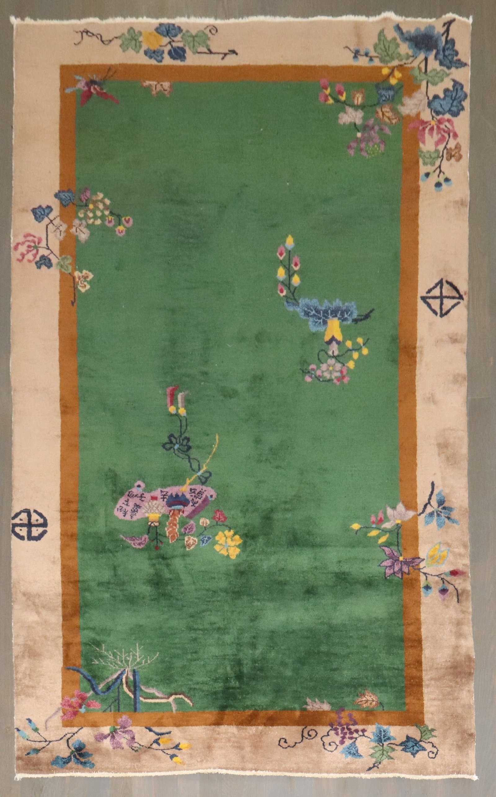 3' 10" x 6' 9" Chinese Art Deco Green Accent Rug: 3' 10" x 6' 9" Chinese Art Deco Green Accent Rug A pre-owned 1930s Chinese Art Deco accent rug with a green field and decorative floral border motifs. Specifications Type: Chinese Art Deco rug Categor