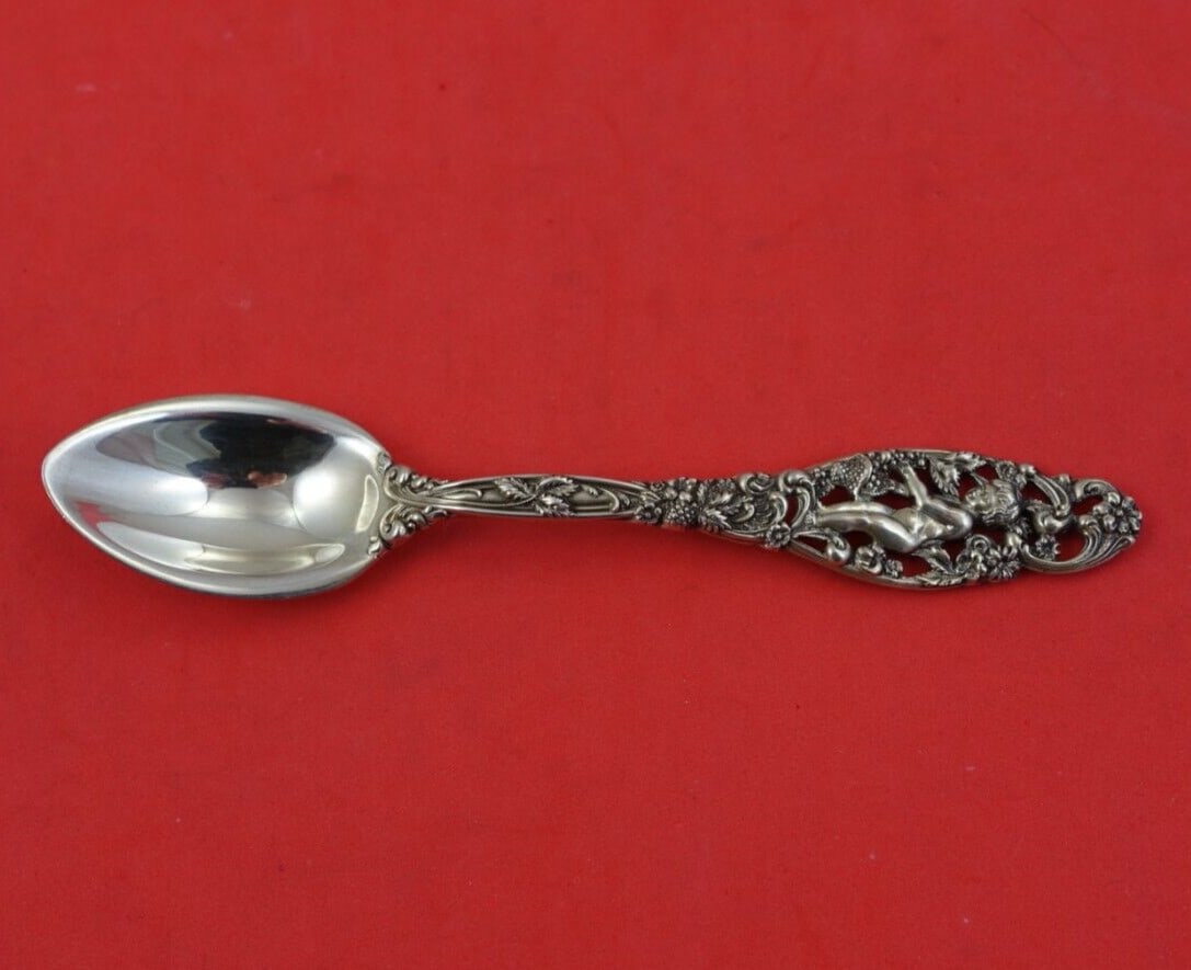 Dominick & Haff Labors of Cupid Sterling Silver Grapefruit Spoon: Dominick & Haff Labors of Cupid Sterling Silver Grapefruit Spoon Enhance your dining experience with this exquisite grapefruit spoon from the Labors of Cupid pattern by Dominick & Haff. Crafted from h