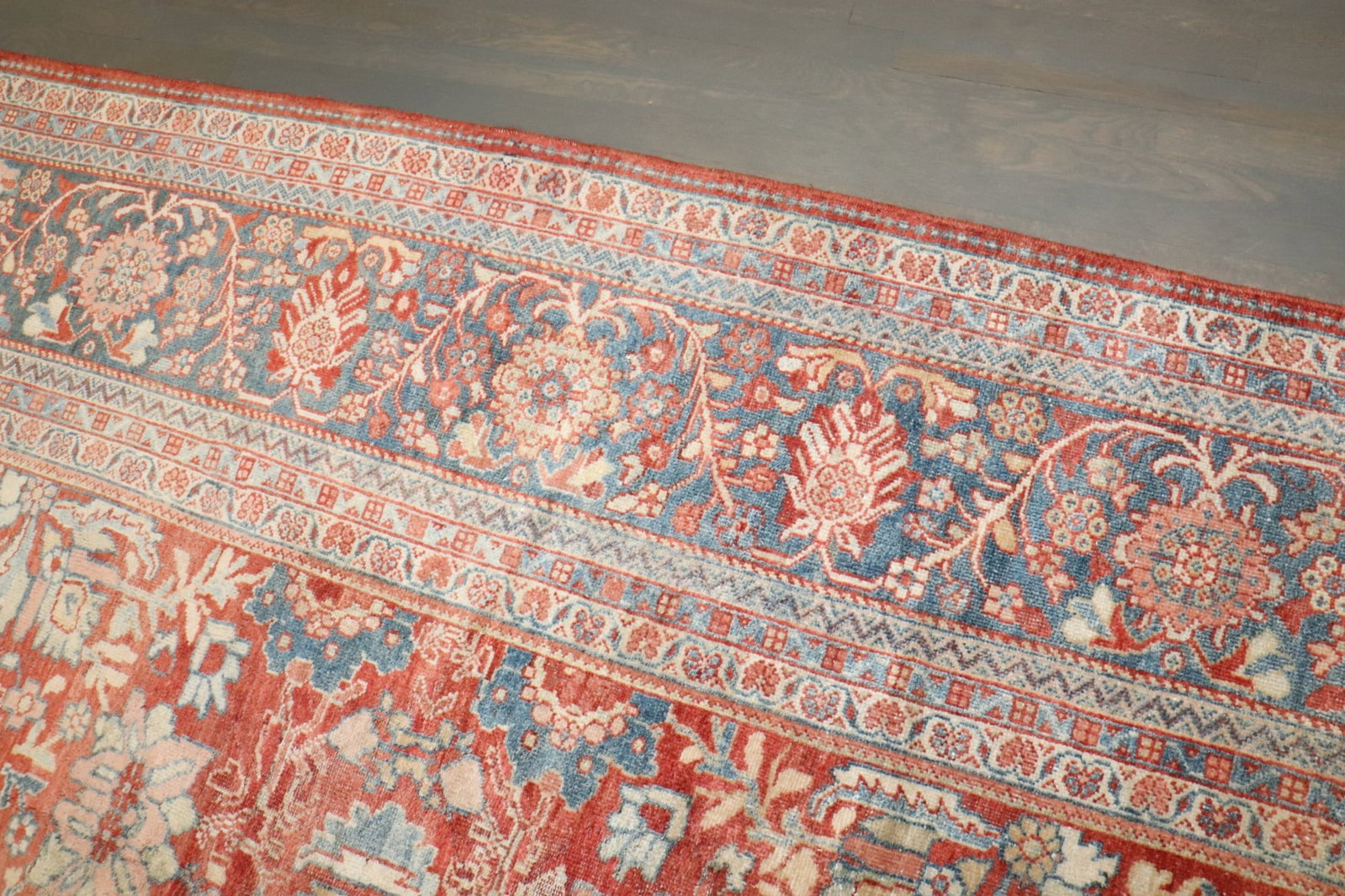 10' 7" x 14' 1" Persian Sultanabad Mahal room carpet: 10' 7" x 14' 1" Persian Sultanabad Mahal room carpet Early 20th century Persian Mahal carpet with a red field and an intricate floral and geometric pattern. This pre-owned room-size carpet is identifi