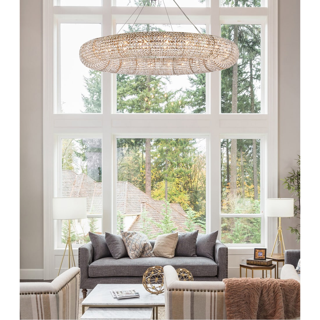 PARIS 59 in Crystal Chandelier 24 Light Gold Finish: PARIS 59 in Crystal Chandelier 24 Light Gold Finish Large modern chandelier with a round halo design and clear crystal accents in a goldish finish. This 24-light fixture is designed for indoor use and