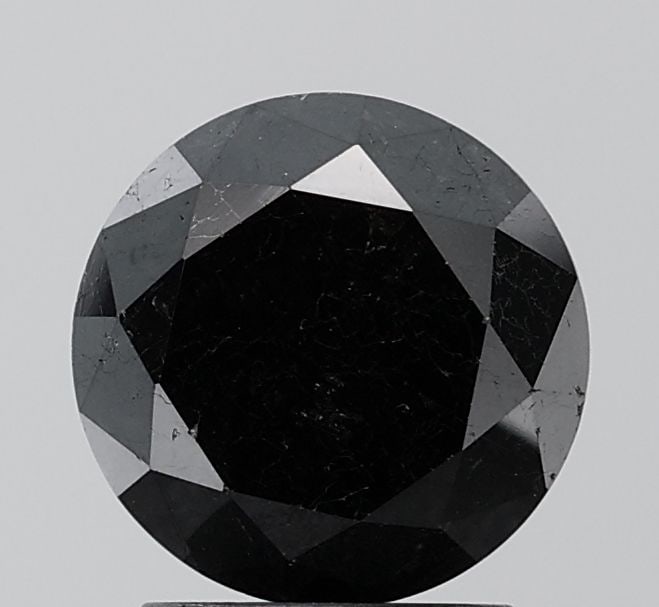 Loose Diamond - ROUND 2.55ct Black VS2: Loose Diamond - ROUND 2.55ct Black VS2 Source: Natural Shape: ROUND Carats: 2.55 Color: Black Certification: NONE Video: Video Link PLEASE NOTE: Framed, Large, or heavy items do not have shipping cost